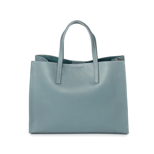 HANSOMFY new fashion leather bag shopping bag bag of large capacity portable